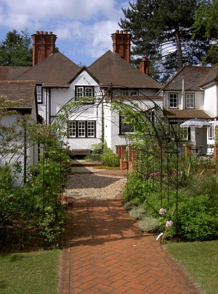 View through pergola to house